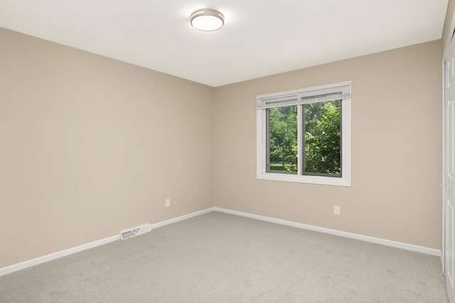 2217 73rd Ct N, Brooklyn Park, MN 55444 - unfurnished room featuring light carpet