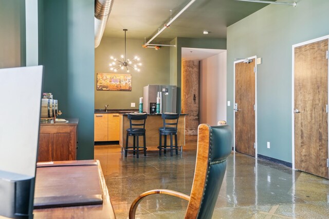 350 Saint Peter St Unit 1110, Saint Paul, MN 55102 - dining space with a chandelier and a high ceiling