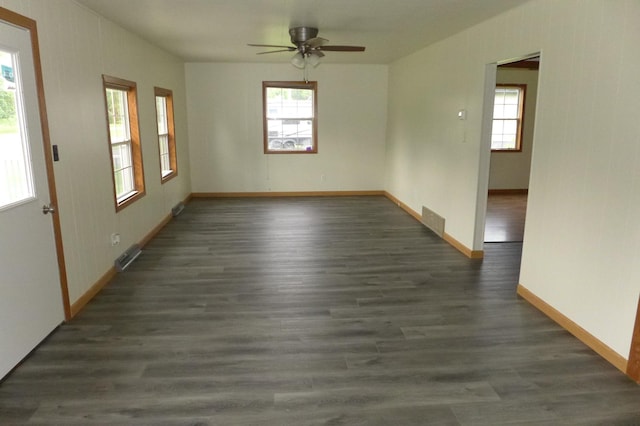 N6217 Kirk Rd, Durand, WI 54736 - empty room featuring dark wood-style floors and ceiling fan