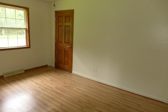 N6217 Kirk Rd, Durand, WI 54736 - spare room with light wood finished floors and baseboards