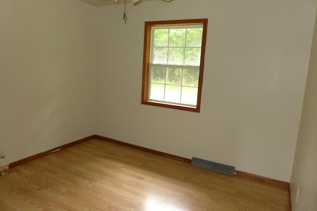 N6217 Kirk Rd, Durand, WI 54736 - unfurnished room with light wood-style flooring and baseboards