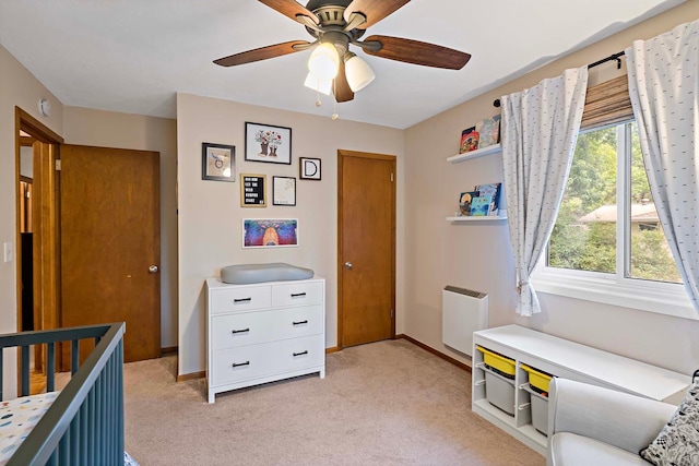 941 Cannon Ave, Shoreview, MN 55126 - bedroom with light colored carpet and a ceiling fan