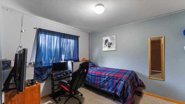 234 17th Ave SE, Saint Joseph, MN 56374 - carpeted bedroom with a textured ceiling and an office area
