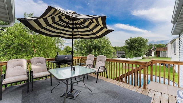 234 17th Ave SE, Saint Joseph, MN 56374 - wooden deck featuring a yard and grilling area