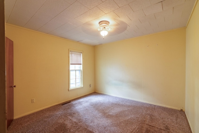 421 Moore St, Blue Earth, MN 56013 - carpeted empty room featuring a ceiling fan and baseboards