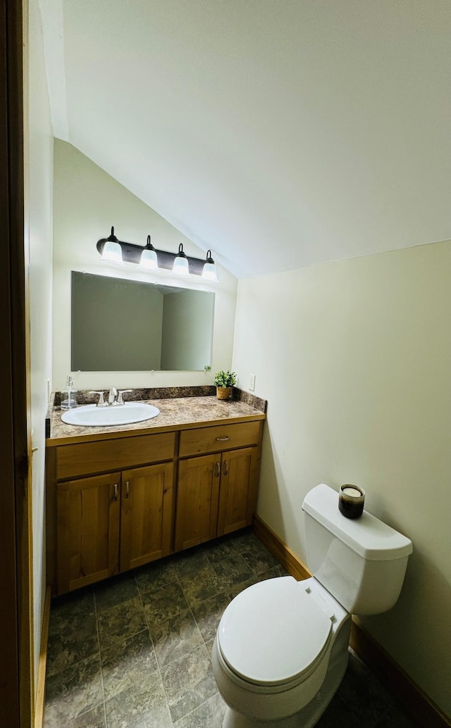 2795 40th St NW, Hackensack, MN 56452 - half bath with lofted ceiling, vanity, and stone finish floors
