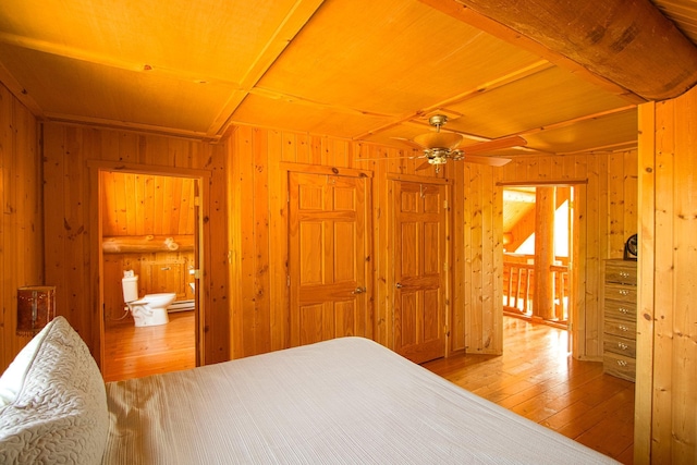 2338 Olson Rd, Blackhoof Twp, MN 55718 - bedroom featuring hardwood / wood-style flooring, wooden walls, and wooden ceiling