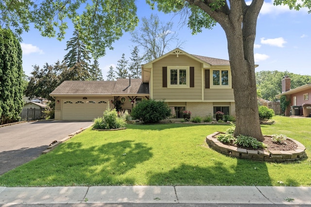 6469 Deerwood Ln N, Maple Grove, MN 55369 - split level home with driveway, a garage, and brick siding