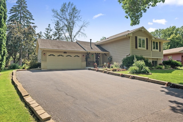6469 Deerwood Ln N, Maple Grove, MN 55369 - split level home with an attached garage, asphalt driveway, a front yard, and brick siding