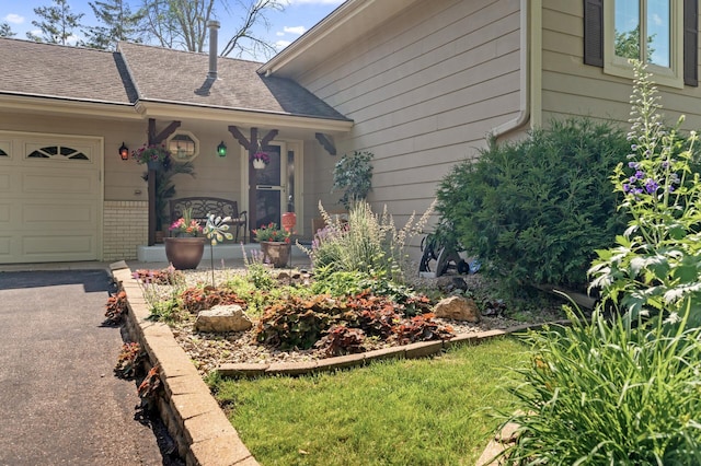 6469 Deerwood Ln N, Maple Grove, MN 55369 - doorway to property with an attached garage and brick siding