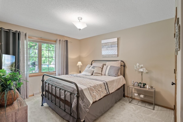 6469 Deerwood Ln N, Maple Grove, MN 55369 - bedroom featuring light colored carpet and a textured ceiling