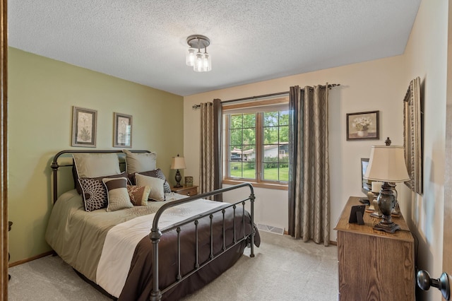 6469 Deerwood Ln N, Maple Grove, MN 55369 - bedroom featuring light colored carpet and a textured ceiling