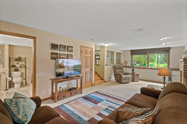 6469 Deerwood Ln N, Maple Grove, MN 55369 - living room featuring a textured ceiling, stairs, and carpet flooring