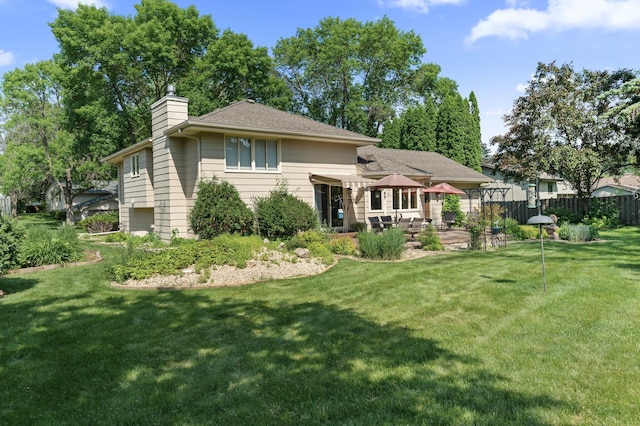 6469 Deerwood Ln N, Maple Grove, MN 55369 - back of house featuring a chimney and a patio