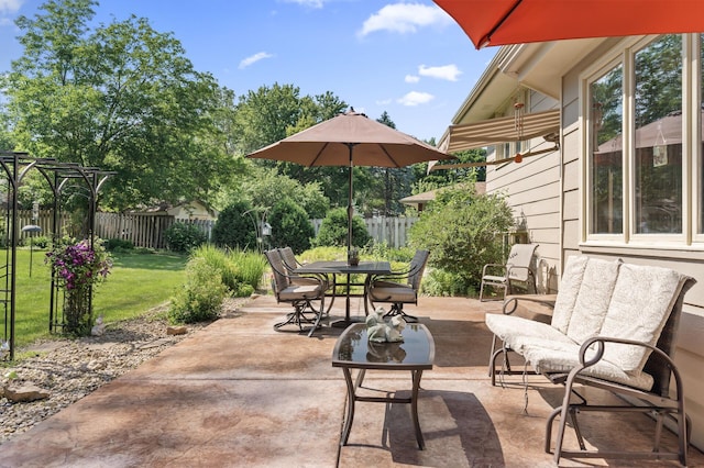 6469 Deerwood Ln N, Maple Grove, MN 55369 - fenced backyard with a patio and outdoor dining space