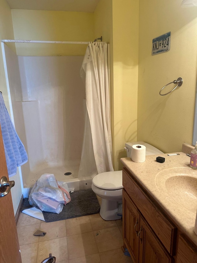 11162 Olympia Ave, Becker, MN 55308 - bathroom featuring a stall shower, vanity, and tile patterned floors