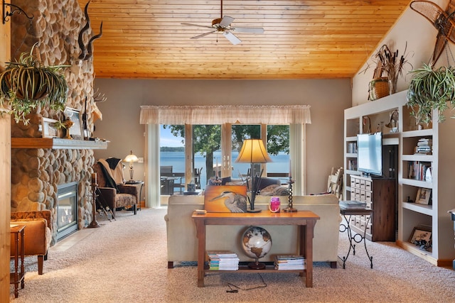 2282 71st St, Georgetown Twp, WI 54853 - carpeted living area with wood ceiling, a ceiling fan, and a stone fireplace