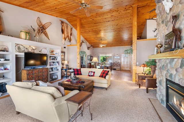 2282 71st St, Georgetown Twp, WI 54853 - carpeted living area with a ceiling fan, a fireplace, wooden ceiling, and high vaulted ceiling