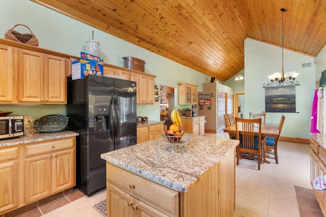 2282 71st St, Georgetown Twp, WI 54853 - kitchen featuring black fridge with ice dispenser, stainless steel microwave, lofted ceiling, wood ceiling, and light brown cabinets