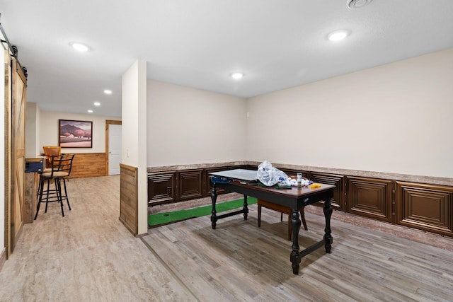 2282 71st St, Georgetown Twp, WI 54853 - home office featuring light wood-type flooring, a wainscoted wall, and recessed lighting