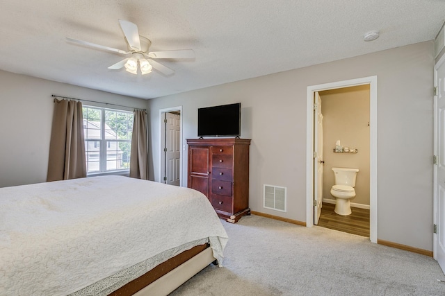 16835 78th Pl N, Maple Grove, MN 55311 - bedroom with light colored carpet, ceiling fan, and ensuite bathroom