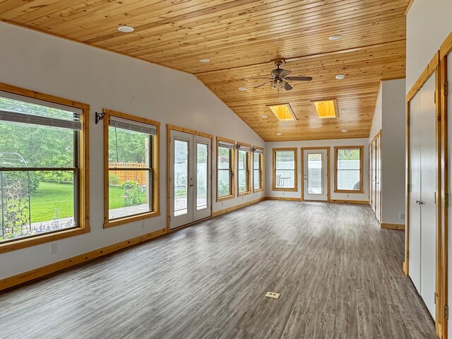607 1st St, Marshall, MN 56258 - unfurnished living room with wooden ceiling, plenty of natural light, lofted ceiling, wood finished floors, and a ceiling fan
