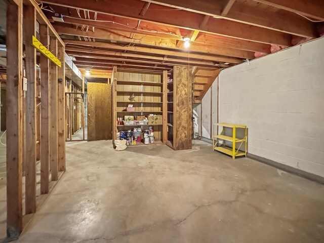607 1st St, Marshall, MN 56258 - unfinished below grade area featuring concrete block wall