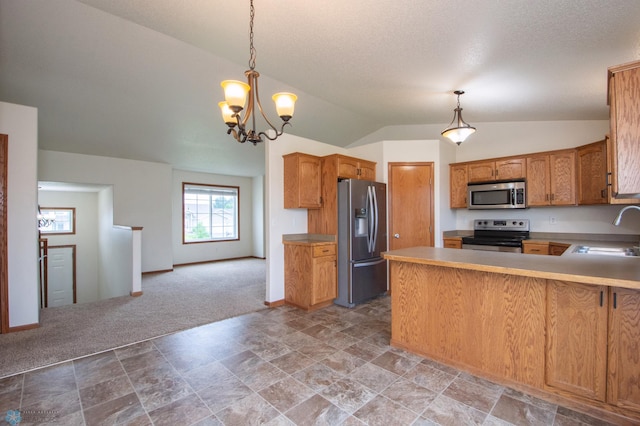3661 Taylor St S, Fargo, ND 58104 - kitchen with stainless steel appliances, light carpet, a peninsula, a chandelier, and vaulted ceiling