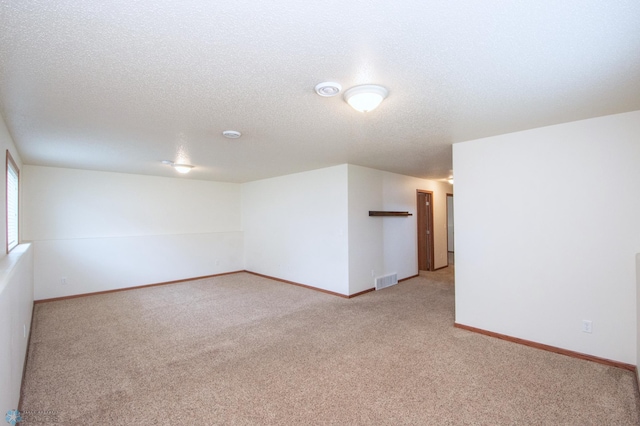 3661 Taylor St S, Fargo, ND 58104 - unfurnished room with light colored carpet and a textured ceiling