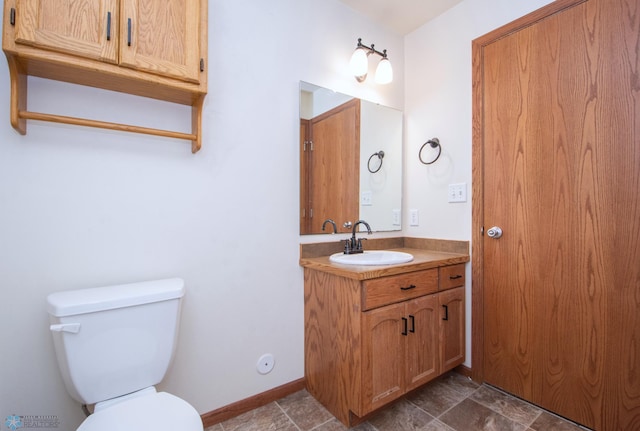 3661 Taylor St S, Fargo, ND 58104 - bathroom featuring vanity and toilet