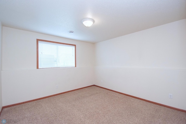 3661 Taylor St S, Fargo, ND 58104 - empty room featuring carpet flooring and baseboards