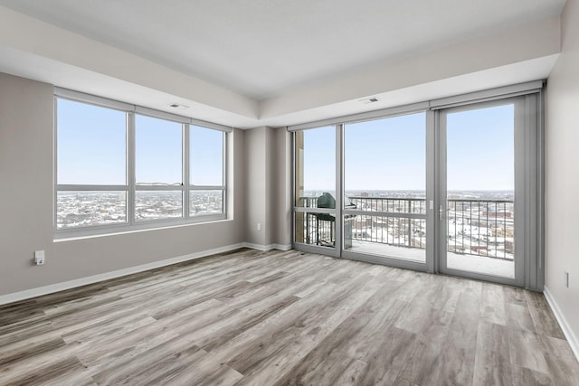 929 Portland Ave Unit 2106, Minneapolis, MN 55404 - empty room with wood finished floors