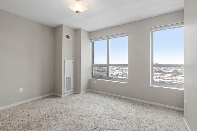 929 Portland Ave Unit 2106, Minneapolis, MN 55404 - carpeted empty room featuring baseboards
