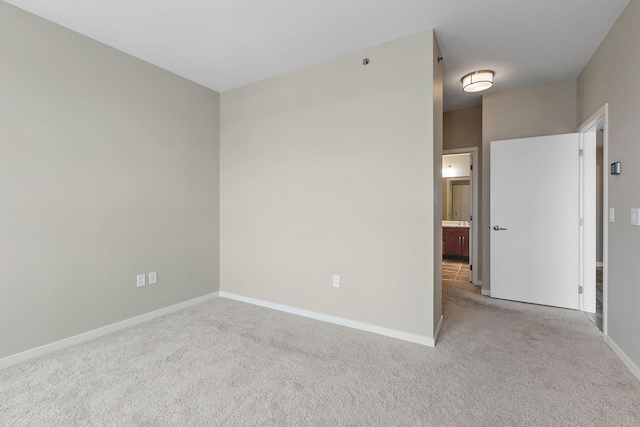 929 Portland Ave Unit 2106, Minneapolis, MN 55404 - carpeted empty room featuring baseboards