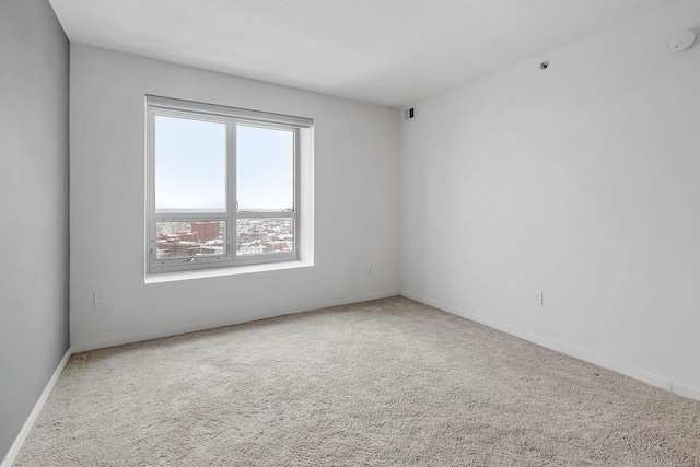 929 Portland Ave Unit 2106, Minneapolis, MN 55404 - empty room with carpet floors and a smoke detector