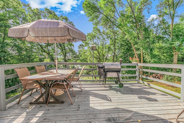 57975 226th St, Litchfield, MN 55355 - deck with a grill and outdoor dining area