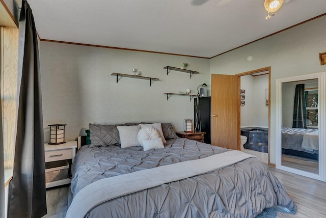 57975 226th St, Litchfield, MN 55355 - bedroom featuring wood finished floors and ornamental molding