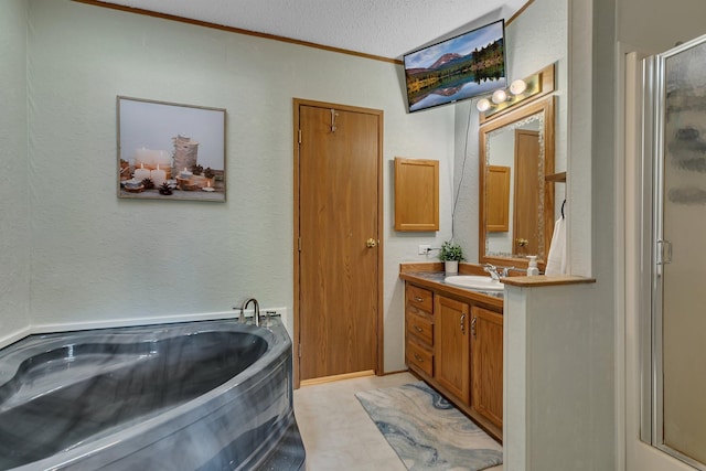 57975 226th St, Litchfield, MN 55355 - bathroom with vanity, a shower stall, crown molding, a garden tub, and a textured ceiling