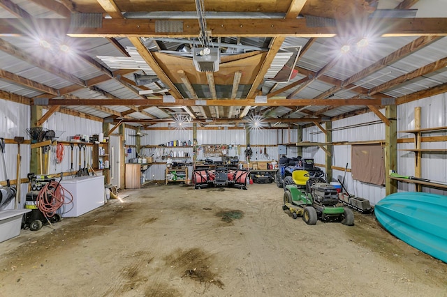57975 226th St, Litchfield, MN 55355 - garage with a garage door opener and metal wall