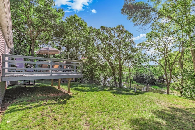 57975 226th St, Litchfield, MN 55355 - view of grassy yard featuring a wooden deck