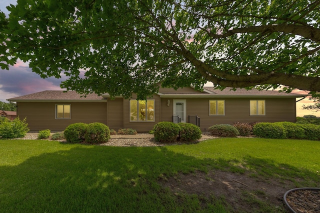 900 11th Ave SE, Waseca, MN 56093 - ranch-style house with a lawn