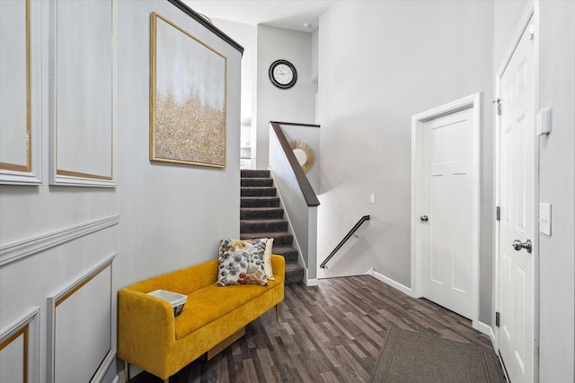 15005 Quintana St NW, Ramsey, MN 55303 - staircase featuring wood finished floors and baseboards