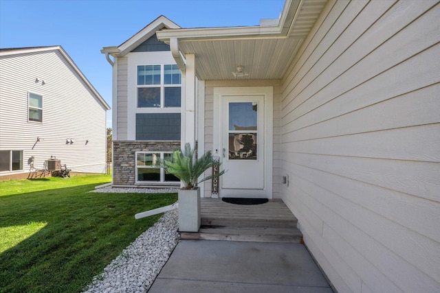 15005 Quintana St NW, Ramsey, MN 55303 - entrance to property with stone siding and a lawn