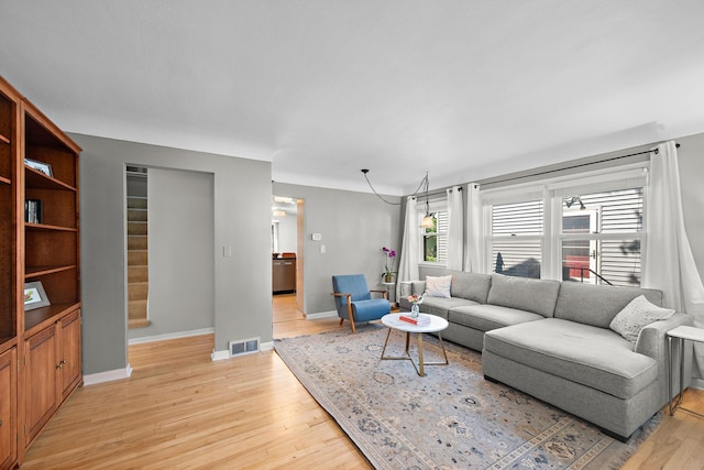 1890 Sheridan Ave, Saint Paul, MN 55116 - living room with light wood-type flooring and baseboards