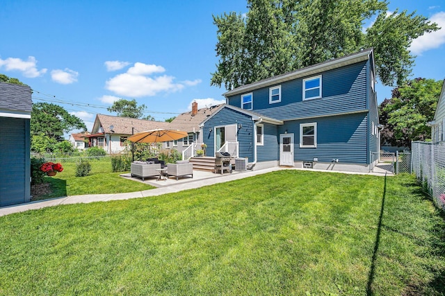 1890 Sheridan Ave, Saint Paul, MN 55116 - rear view of property featuring outdoor lounge area, a fenced backyard, a patio, and entry steps