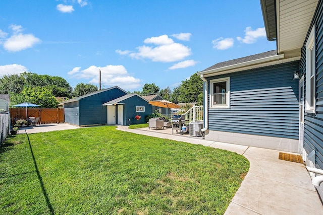 1890 Sheridan Ave, Saint Paul, MN 55116 - view of yard featuring a patio and an outbuilding