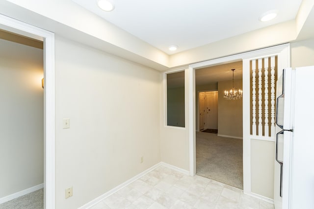 2051 Carriage Dr SW Unit 2051D, Rochester, MN 55902 - spare room with a chandelier, light colored carpet, and recessed lighting