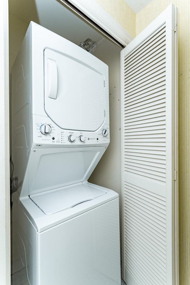 2051 Carriage Dr SW Unit 2051D, Rochester, MN 55902 - washroom with stacked washing machine and dryer