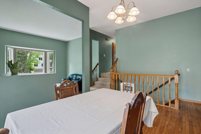 10989 Eagle Lake Blvd, Maple Grove, MN 55369 - dining room featuring a chandelier and wood-type flooring