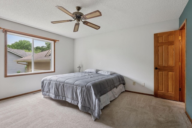 10989 Eagle Lake Blvd, Maple Grove, MN 55369 - bedroom with carpet floors, a textured ceiling, and a ceiling fan